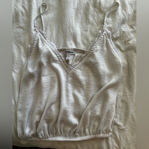 White Express top with lace detail along the neckline